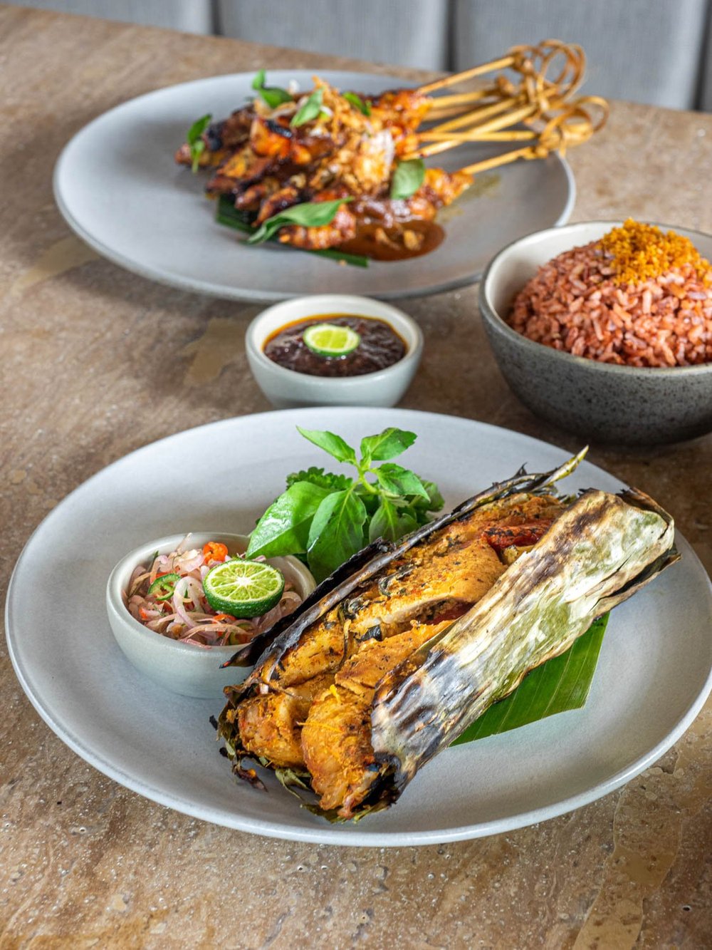 Pepes ikan, fish steamed in banana leaf